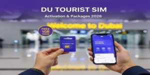 Alt Text: A traveler holding a free Du Tourist SIM card pack at Dubai Airport with a smartphone showing activation code *122#